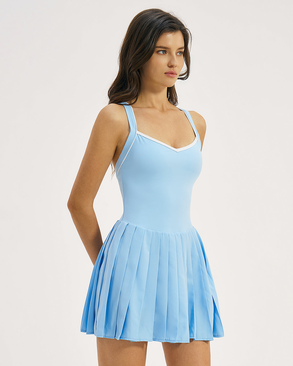 QINSEN Womens V Neck Pleated Tennis Dresses Built in Shorts Cross Back Sleeveless Athletic Dress with Pockets