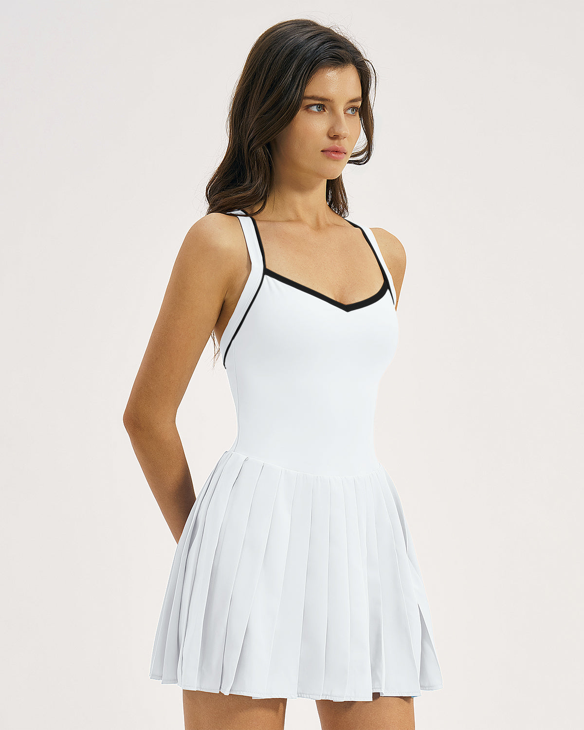 QINSEN Womens V Neck Pleated Tennis Dresses Built in Shorts Cross Back Sleeveless Athletic Dress with Pockets