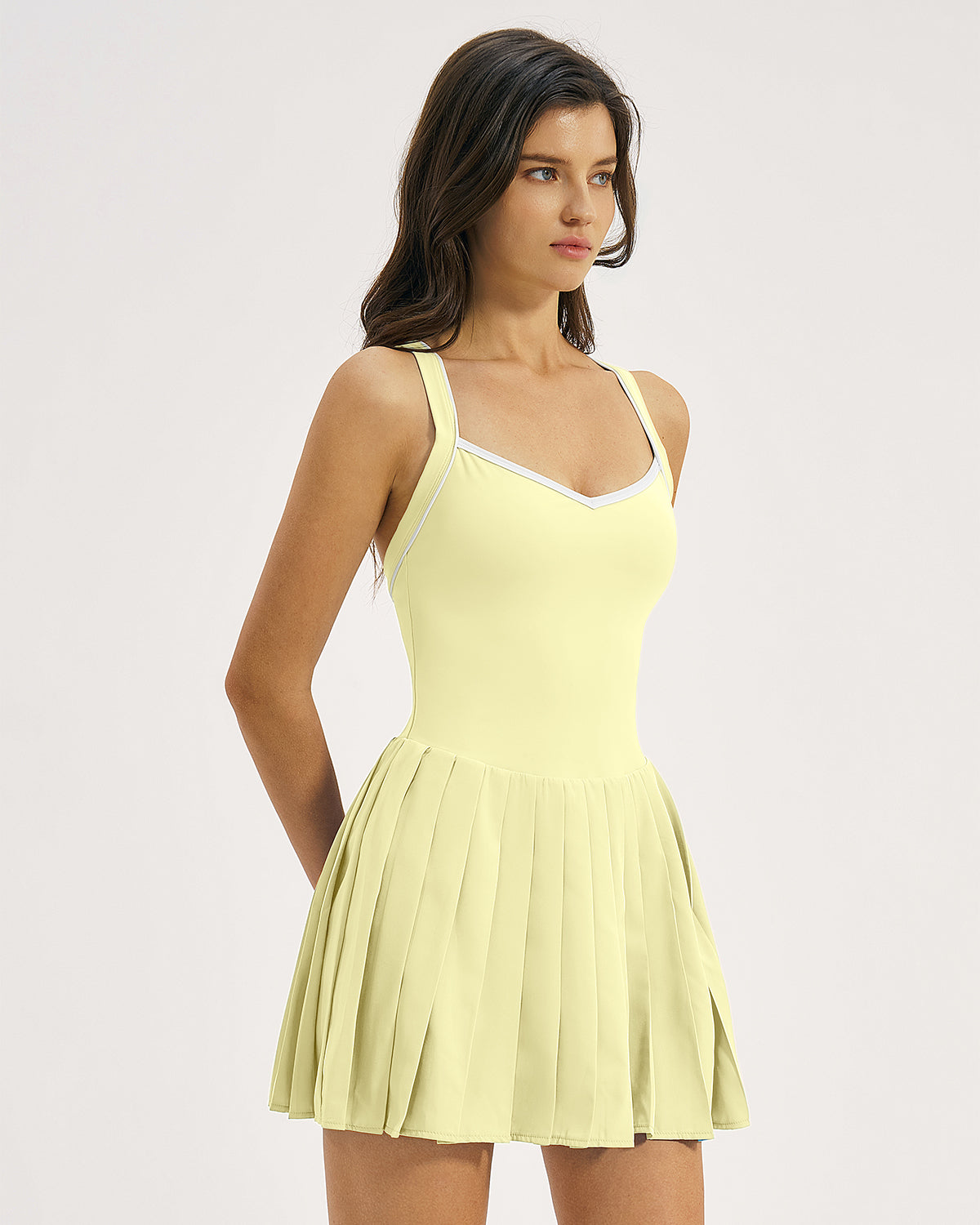 QINSEN Womens V Neck Pleated Tennis Dresses Built in Shorts Cross Back Sleeveless Athletic Dress with Pockets