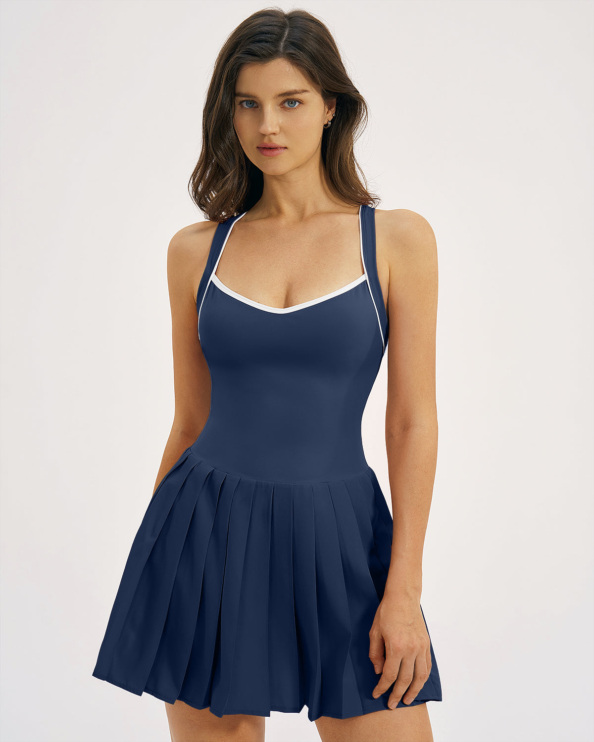 QINSEN Womens V Neck Pleated Tennis Dresses Built in Shorts Cross Back Sleeveless Athletic Dress with Pockets